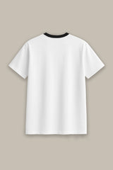 White t-shirt with black trim on a beige background