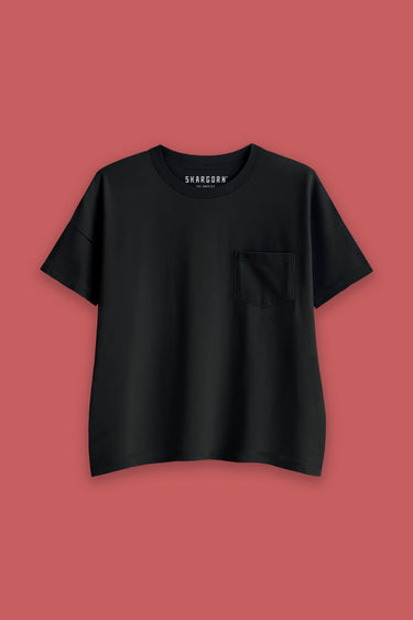 Black t-shirt with a pocket on a red background